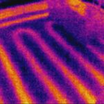 Thermal image of in floor hydronic radiant heating system at work